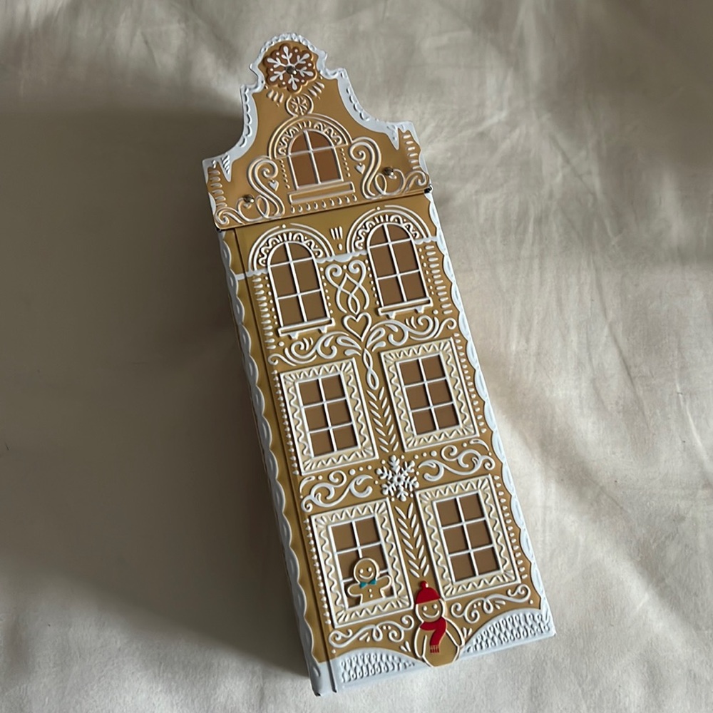 Marks&Spencer wind up tin gingerbread house holiday decor.